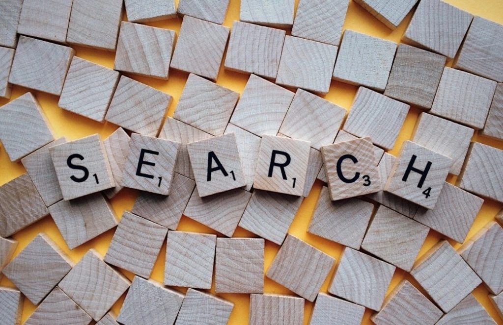Wooden letter blocks spelling SEARCH